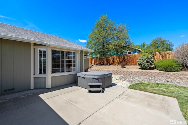 1359 Whooping Crane Dr, Sparks, NV 89441 - view of patio / terrace with a hot tub and a fenced backyard