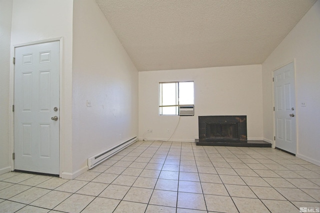 2375 Tripp Dr # 10, Reno, NV 89512 - unfurnished living room featuring baseboard heating, a textured ceiling, a fireplace with raised hearth, baseboards, and vaulted ceiling