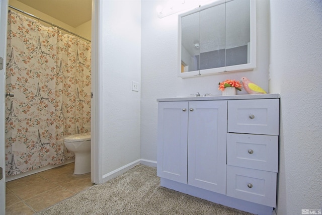 2375 Tripp Dr # 10, Reno, NV 89512 - full bath featuring toilet, vanity, baseboards, and tile patterned floors