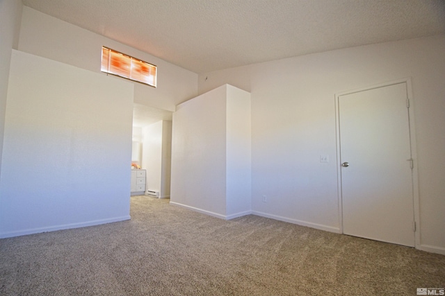 2375 Tripp Dr # 10, Reno, NV 89512 - carpeted spare room featuring baseboards and a textured ceiling