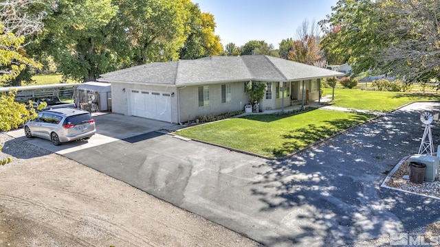 930 Edgewater, Fallon, NV 89406 - single story home featuring a garage, driveway, a front lawn, roof with shingles, and stucco siding