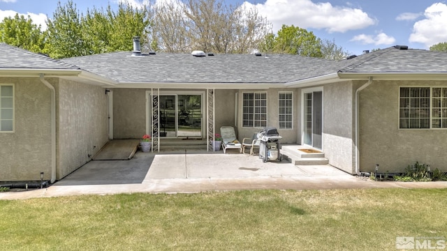 930 Edgewater, Fallon, NV 89406 - rear view of house featuring stucco siding, a patio, entry steps, and a shingled roof