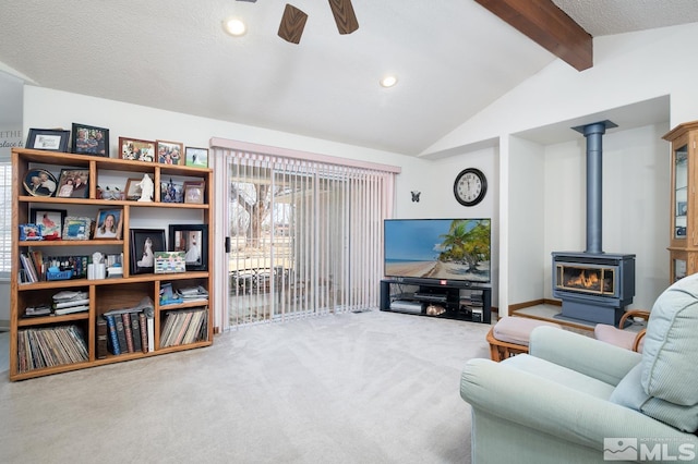 930 Edgewater, Fallon, NV 89406 - living room with ceiling fan, carpet floors, a wood stove, and recessed lighting