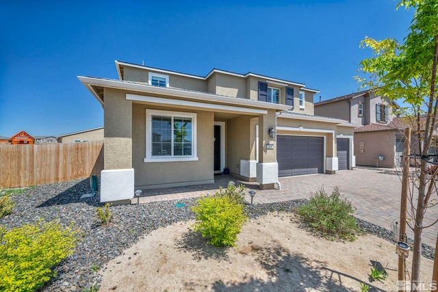 7836 Tarkio Ct, Sparks, NV 89436 - view of front of property featuring fence, stucco siding, and decorative driveway