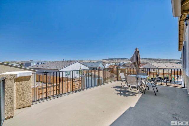 7836 Tarkio Ct, Sparks, NV 89436 - view of patio / terrace with outdoor dining space, a residential view, and a balcony