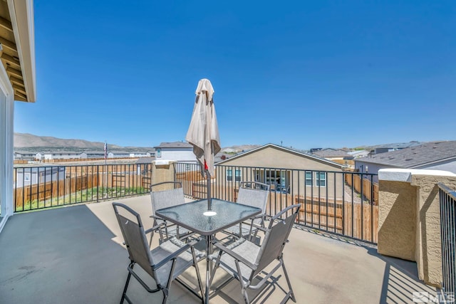 7836 Tarkio Ct, Sparks, NV 89436 - view of patio with a mountain view, outdoor dining area, and a residential view
