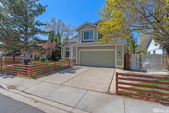 5276 Simons Dr, Reno, NV 89523 - view of front facade featuring concrete driveway, a fenced front yard, and a garage