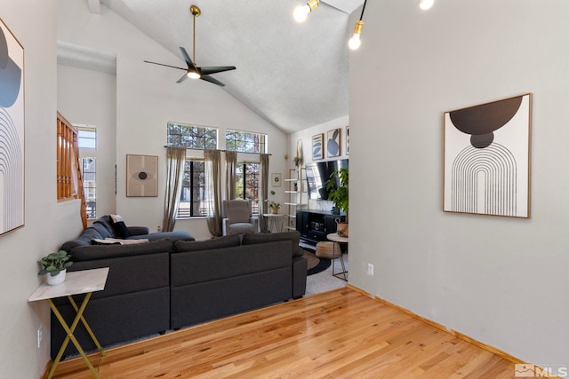 5276 Simons Dr, Reno, NV 89523 - living room with ceiling fan, wood finished floors, plenty of natural light, and high vaulted ceiling