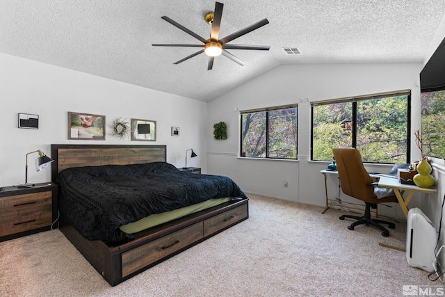 5276 Simons Dr, Reno, NV 89523 - bedroom featuring vaulted ceiling, carpet flooring, a textured ceiling, and ceiling fan