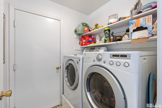 5276 Simons Dr, Reno, NV 89523 - clothes washing area with independent washer and dryer