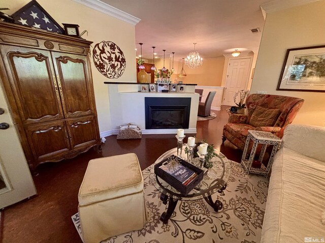 900 S Meadows Pkwy Apt 5021, Reno, NV 89521 - living room featuring crown molding, a glass covered fireplace, and a chandelier