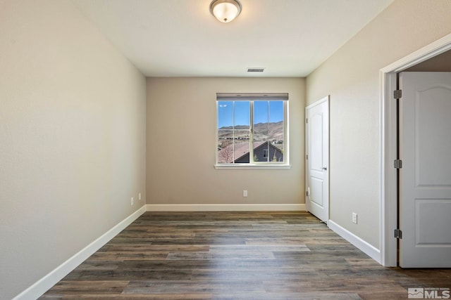 1680 Verdi Vista Ct, Reno, NV 89523 - unfurnished bedroom with dark wood-style flooring