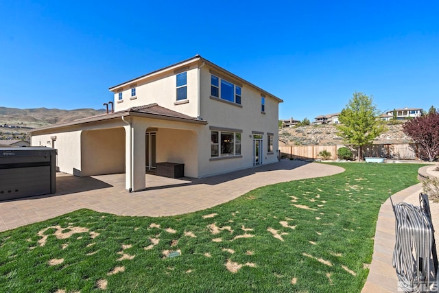 1680 Verdi Vista Ct, Reno, NV 89523 - back of house with stucco siding and a patio