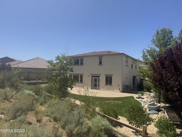 1680 Verdi Vista Ct, Reno, NV 89523 - back of property featuring stucco siding and a patio