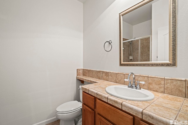 10655 Birch Point Ct, Reno, NV 89521 - full bathroom featuring vanity, tiled shower, and toilet