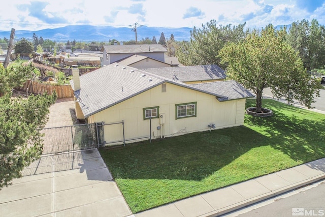 830 Lepori Way, Sparks, NV 89431 - view of property exterior featuring a mountain view, a gate, and a shingled roof