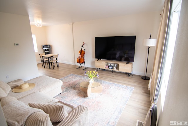 100 Bisset Ct Unit B, Reno, NV 89503 - living area featuring light wood-style floors and baseboards