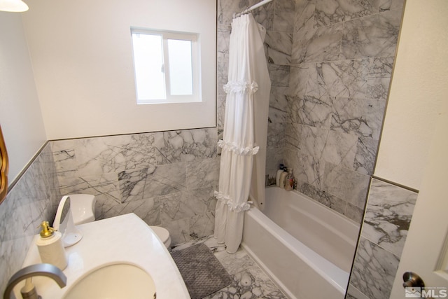 100 Bisset Ct Unit B, Reno, NV 89503 - bathroom with a sink, marble finish flooring, shower / bath combo with shower curtain, tile walls, and toilet