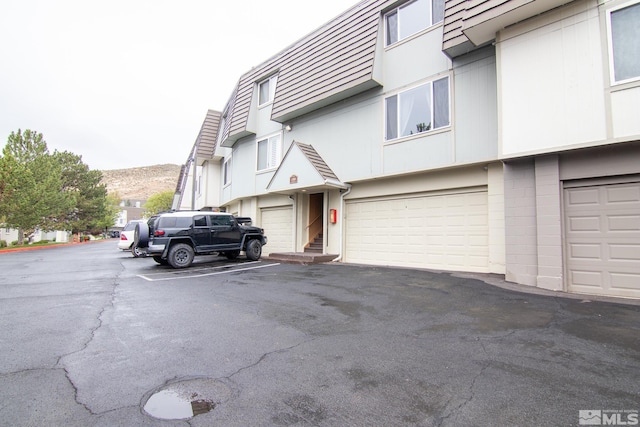 100 Bisset Ct Unit B, Reno, NV 89503 - view of front facade with an attached garage