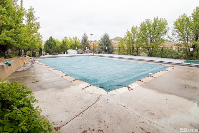 100 Bisset Ct Unit B, Reno, NV 89503 - view of swimming pool with a patio area and fence