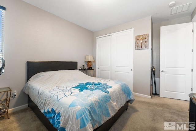 2449 Butte Creek Dr, Sparks, NV 89436 - bedroom featuring baseboards, carpet floors, and a closet