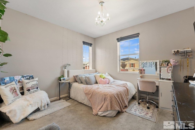2449 Butte Creek Dr, Sparks, NV 89436 - bedroom featuring carpet floors, a chandelier, an office area, and baseboards