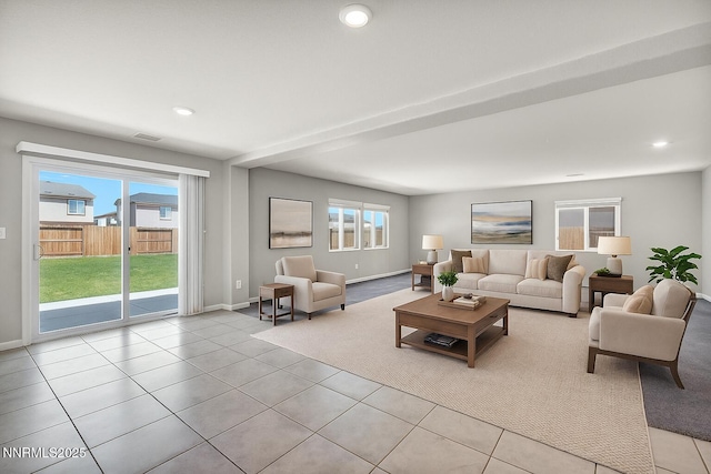 8853 Finnsech, Reno, NV 89506 - living area featuring light tile patterned floors and recessed lighting