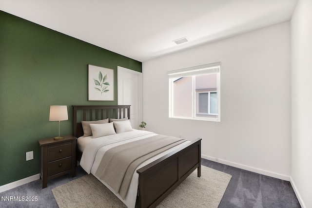 8853 Finnsech, Reno, NV 89506 - bedroom featuring dark carpet and baseboards