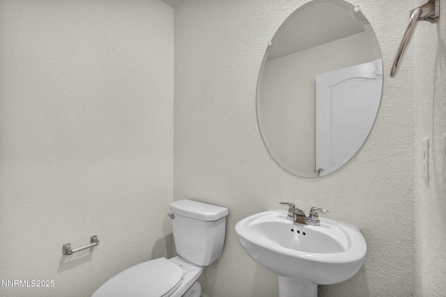 8853 Finnsech, Reno, NV 89506 - bathroom featuring a sink and toilet