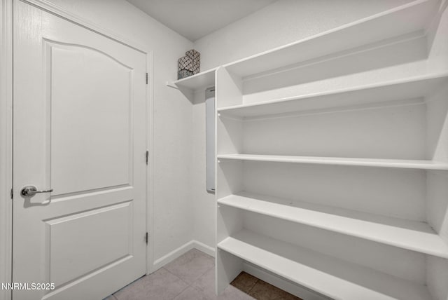 8853 Finnsech, Reno, NV 89506 - spacious closet with light tile patterned floors