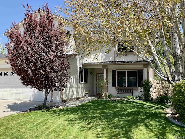 1348 Chichester Dr, Gardnerville, NV 89410 - obstructed view of property featuring a front lawn, driveway, and a garage