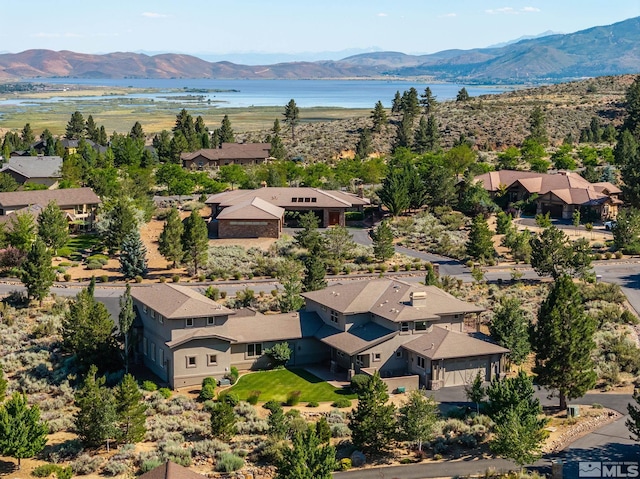 202 Paddington Ct, Reno, NV 89511 - aerial perspective of suburban area with a water and mountain view