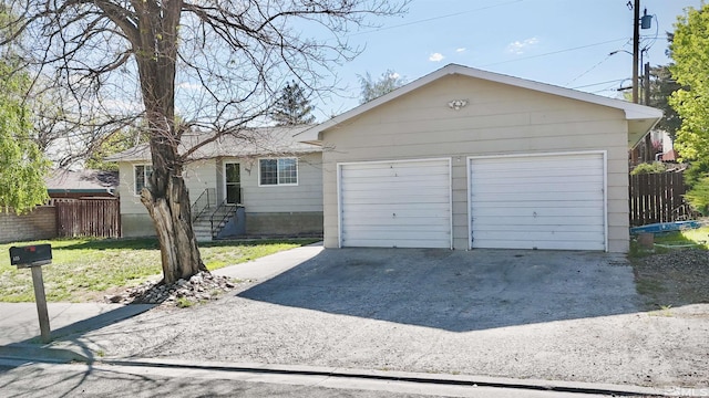 garage with fence