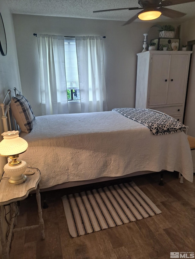 4550 Matich Dr, Reno, NV 89502 - bedroom with wood finished floors and a ceiling fan