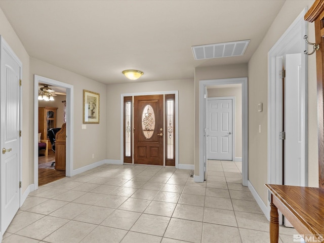 137 Desert Lakes Dr, Fernley, NV 89408 - entrance foyer with light tile patterned floors and baseboards