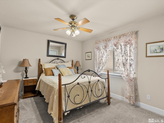 137 Desert Lakes Dr, Fernley, NV 89408 - carpeted bedroom featuring baseboards and a ceiling fan