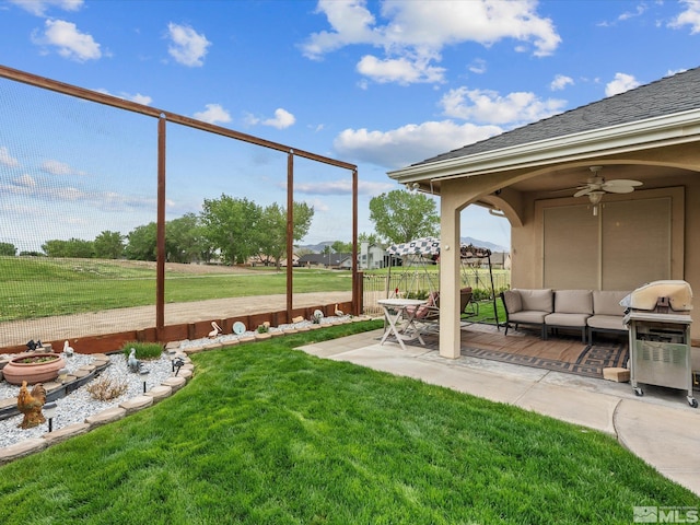 137 Desert Lakes Dr, Fernley, NV 89408 - view of yard featuring a patio, an outdoor living space, and a ceiling fan