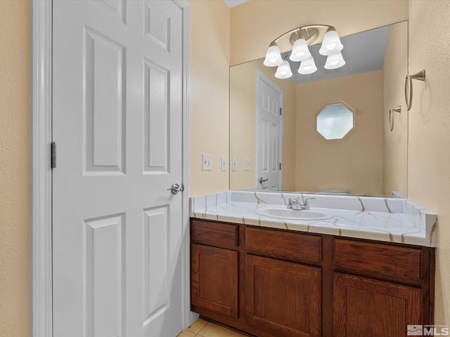 1820 Bogie Ct, Fernley, NV 89408 - bathroom with vanity, tile patterned flooring, and a chandelier