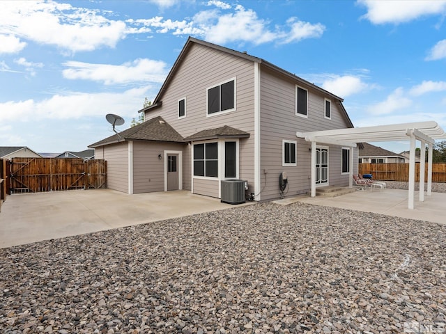 1820 Bogie Ct, Fernley, NV 89408 - back of property featuring a pergola, a patio, a fenced backyard, and central air condition unit