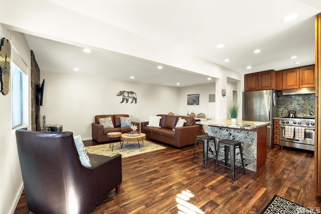758 Milky Way Ct Unit E, Stateline, NV 89449 - living room with dark wood-type flooring, recessed lighting, and baseboards