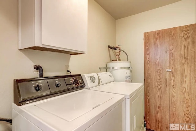 758 Milky Way Ct Unit E, Stateline, NV 89449 - laundry room with strapped water heater, washing machine and clothes dryer, and cabinet space