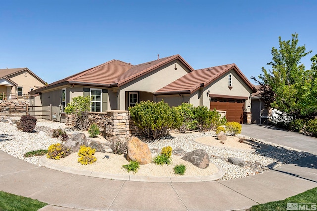 ranch-style home with stucco siding, an attached garage, driveway, a tile roof, and fence