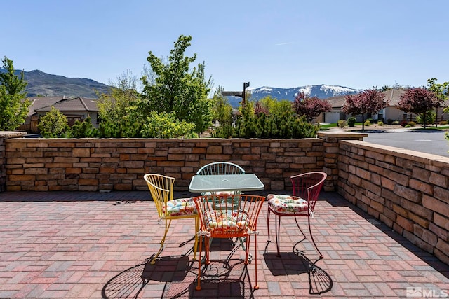 view of patio featuring a mountain view