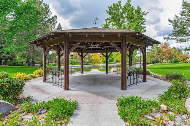 4941 Reggie Rd, Reno, NV 89502 - view of property's community with a gazebo, a yard, and a water view