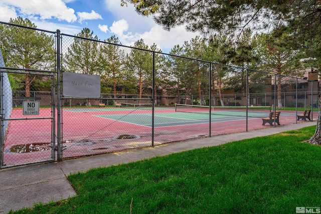 4941 Reggie Rd, Reno, NV 89502 - view of tennis court with fence and a gate