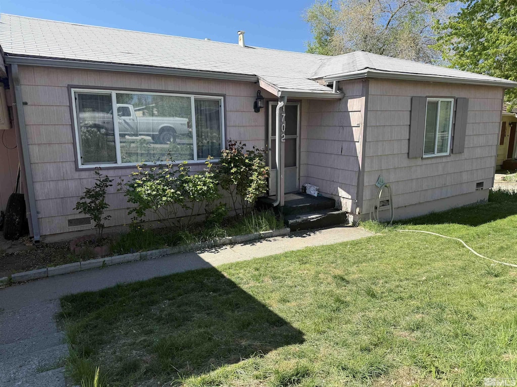 1702 Grandview Ave, Reno, NV 89503 - ranch-style house with a front yard and roof with shingles