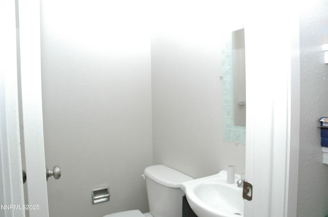 1424 E 9th Unit 2, Reno, NV 89512 - half bath with toilet and a sink