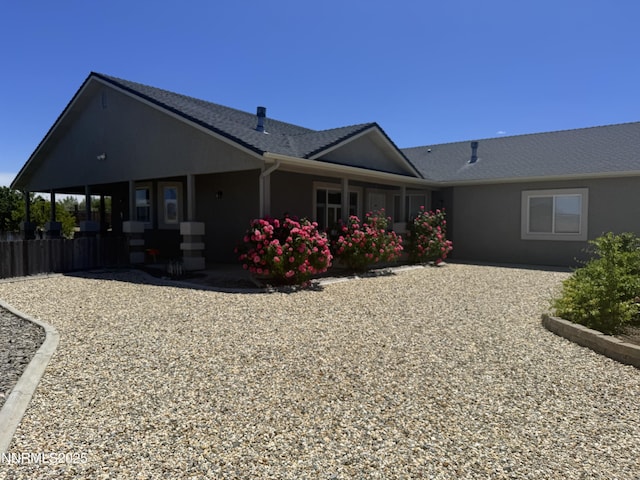 921 Red Rock Rd, Fernley, NV 89408 - view of side of home featuring stucco siding