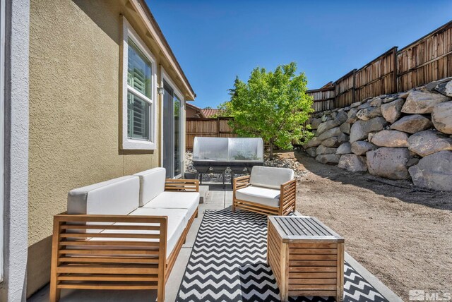 5132 Ironstone Cir, Sparks, NV 89436 - view of patio with outdoor lounge area and a fenced backyard