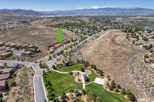 5132 Ironstone Cir, Sparks, NV 89436 - aerial view of property and surrounding area with mountains and nearby suburban area
